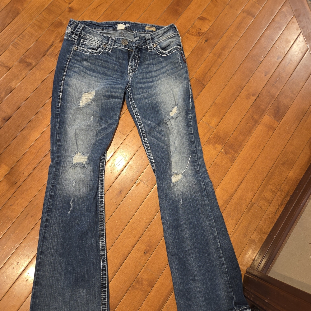 Silver Jeans Distressed Blue Flare Jeans